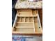 The kitchen features a custom wood drawer with built in storage dividers at 2547 Stony Brook Ln, Clearwater, FL 33761