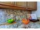 Close up of granite counters showing detail and the surrounding cabinets at 2547 Stony Brook Ln, Clearwater, FL 33761
