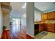 Sun-filled space includes hardwood floors, fireplace, a skylight, and an eat-in kitchen bar at 2547 Stony Brook Ln, Clearwater, FL 33761