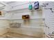 Spacious pantry features metal shelving with plastic containers at 2547 Stony Brook Ln, Clearwater, FL 33761