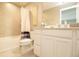Bright bathroom with a shower and bathtub combination at 3000 Jacob Crossing Ln, Holiday, FL 34691