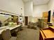 Backstage area with mirrors, chairs, exit door and props with ample space for performers at 3276 Hilary Cir, Palm Harbor, FL 34684