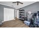 Spacious bonus room with hardwood floors, ample storage, and great potential for customization to suit your needs at 3276 Hilary Cir, Palm Harbor, FL 34684