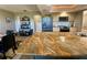 Spacious kitchen featuring granite countertops, stainless steel appliances, and sleek black refrigerator at 3276 Hilary Cir, Palm Harbor, FL 34684
