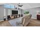 Bright living room featuring clerestory windows and a vaulted ceiling at 3276 Hilary Cir, Palm Harbor, FL 34684