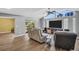 Bright living room featuring clerestory windows and vaulted ceiling at 3276 Hilary Cir, Palm Harbor, FL 34684