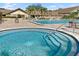 Resort-style pool featuring a separate hot tub and lounge chairs for relaxing under the sun at 3276 Hilary Cir, Palm Harbor, FL 34684