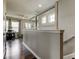 Bright living room featuring stylish hardwood floors and neutral tones, perfect for modern living at 33176 Whisper Pointe Dr, Wesley Chapel, FL 33545