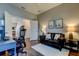Versatile home office featuring hardwood floors, neutral decor, and modern desk setup, ideal for remote work at 33176 Whisper Pointe Dr, Wesley Chapel, FL 33545