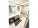 Full bathroom featuring a sink, vanity, toilet, and glass shower at 3400 Gulf Blvd # 102, Belleair Beach, FL 33786