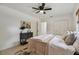 Bedroom featuring a ceiling fan and closet at 36846 Jefferson Ave, Dade City, FL 33523