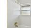 Bright renovated shower with window and gold fixtures at 36846 Jefferson Ave, Dade City, FL 33523
