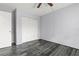 Bedroom featuring a ceiling fan and closet storage at 3709 Greenery Ct # 209, Tampa, FL 33618