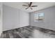A vacant bedroom with a ceiling fan and modern flooring at 3709 Greenery Ct # 209, Tampa, FL 33618