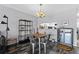 Cozy dining room with a dark wood floor and modern decor at 3709 Greenery Ct # 209, Tampa, FL 33618