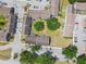 This aerial shot displays the well-manicured condo grounds with mature trees at 3824 Cortez Dr # B, Tampa, FL 33614