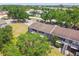 Angle view of townhomes featuring balconies, well maintained landscape and parking at 3824 Cortez Dr # B, Tampa, FL 33614