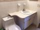Bathroom showcasing toilet, sink and vanity at 3850 Sablewood Dr, Holiday, FL 34691