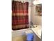 Bathroom showcasing shower/tub combo, toilet, and sink with vanity at 3850 Sablewood Dr, Holiday, FL 34691