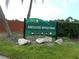 Anclote River Park sign with park activity icons on a sunny day, promoting outdoor recreation at 3850 Sablewood Dr, Holiday, FL 34691