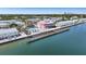 Wonderful aerial view of the community buildings, pool, pier, and waterfront at 5003 Starfish Dr Se # B, St Petersburg, FL 33705