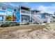 Charming exterior view of the community homes, showcasing their architecture and design at 5003 Starfish Dr Se # B, St Petersburg, FL 33705