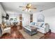 Inviting living room with stylish furnishings, wood flooring, and ample natural light at 5003 Starfish Dr Se # B, St Petersburg, FL 33705
