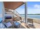 Inviting patio with ample seating, brick pavers, and scenic waterfront views at 5003 Starfish Dr Se # B, St Petersburg, FL 33705