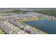 Aerial view of the community with large lakes and well-maintained homes at 5059 Bromeliad Ave, Wimauma, FL 33598
