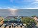 Stunning building featuring lush landscaping with ample parking and expansive water views at 5102 Coquina Key Se Dr # D, St Petersburg, FL 33705