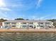 Waterfront condo with private balconies and stairs leading to the water at 5102 Coquina Key Se Dr # D, St Petersburg, FL 33705