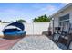 Deck area with outdoor seating and comfortable lounge, perfect for outdoor living at 5117 Fitchburg Dr, Holiday, FL 34690