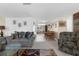 Open living space with a comfortable sofa, and a dining area at 5117 Fitchburg Dr, Holiday, FL 34690