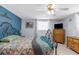 Main bedroom featuring carpet, a bed, a window, and dressers at 5117 Fitchburg Dr, Holiday, FL 34690