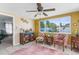 Sun room with natural light, furniture and tile flooring at 5117 Fitchburg Dr, Holiday, FL 34690
