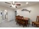 Dining room features a ceiling fan and an ornamental swordfish on the wall at 6225 Scarlet Darter Way, Tampa, FL 33625