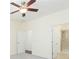 Bright primary bedroom with ensuite bathroom and walk-in shower at 711 Parker Den Dr, Ruskin, FL 33570