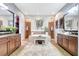 A luxurious bathroom featuring a soaking tub, dual vanities, and stylish decor at 9630 Tree Tops Lake Rd, Tampa, FL 33626
