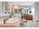 A luxurious bathroom featuring a soaking tub, vanity, and stylish decor at 9630 Tree Tops Lake Rd, Tampa, FL 33626