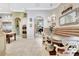 Formal dining area featuring a dining table and chairs with a view into other living spaces at 9630 Tree Tops Lake Rd, Tampa, FL 33626