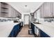Stylish kitchen features ample counter space, stainless steel appliances, and modern cabinetry at 12901 129Th Ave, Largo, FL 33774