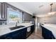Beautifully updated kitchen featuring stainless steel appliances, modern cabinetry, and bright natural light at 12901 129Th Ave, Largo, FL 33774
