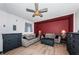 Inviting living room with comfortable sofas, stylish decor, and wood-look flooring at 12901 129Th Ave, Largo, FL 33774