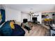 Comfortable living room with hardwood floors and easy access to kitchen area at 12901 129Th Ave, Largo, FL 33774