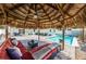 Stunning outdoor oasis with a refreshing pool, a spacious patio, and a cozy gazebo for relaxation at 12901 129Th Ave, Largo, FL 33774