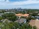 Stunning aerial view of a residential area with a city skyline in the background on a sunny day at 1008 S Armenia Ave # A, Tampa, FL 33629