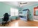 Unique bedroom with a bunk bed and desk offering a practical setup for  at 1008 S Armenia Ave # A, Tampa, FL 33629
