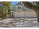 Charming two-story home with a paved driveway, two-car garage, and ample parking at 1008 S Armenia Ave # A, Tampa, FL 33629