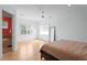 Bright main bedroom featuring wood floors, large windows and a ceiling fan at 1008 S Armenia Ave # A, Tampa, FL 33629