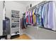 Well-organized walk-in closet features custom shelving and ample storage space for clothes and accessories at 1008 S Armenia Ave # A, Tampa, FL 33629